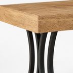 Counter-Height Dining Table with Footrest — close-up detail of tabletop edge and curved leg